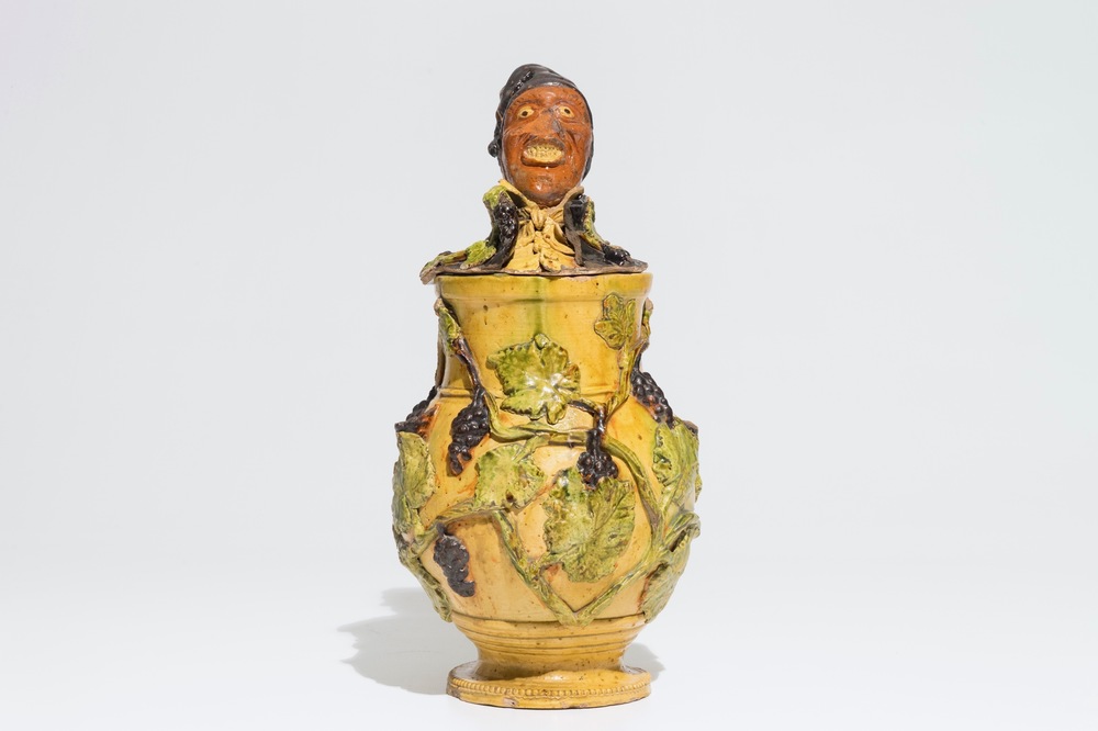 An exceptional Flemish pottery figurative tobacco jar, attr. to Leo Maes, 2nd half 19th C.